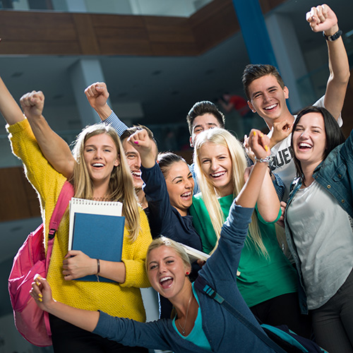 Group of young people cheering